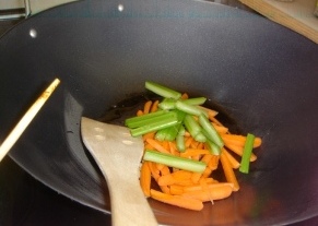 Next add the celery and give it a good stir... if the oil is not enough add some water to the wok