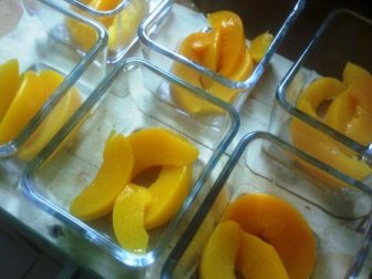 Arrange the peach slices at the bottom of your serving plates